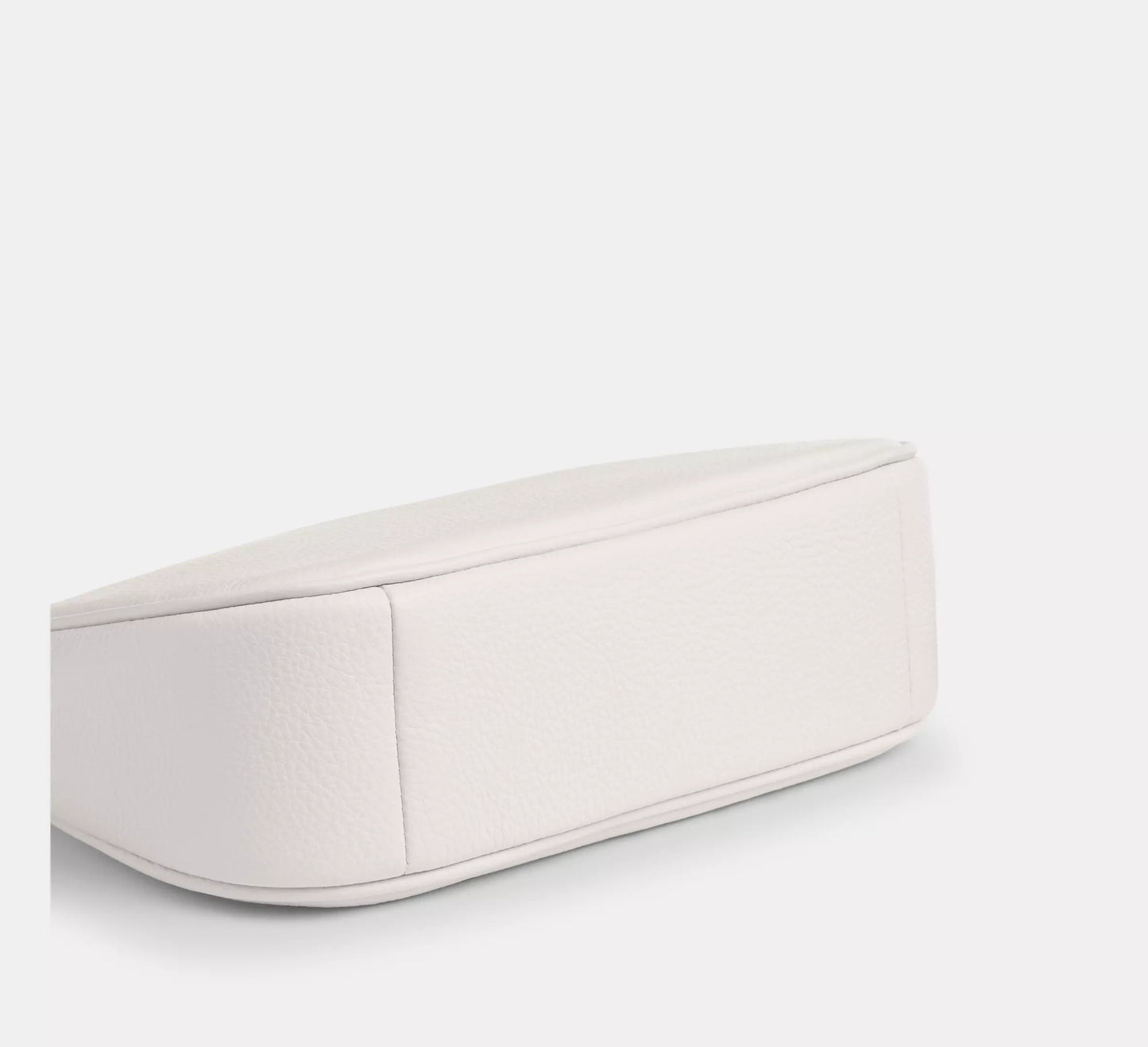 Rectangular ottoman with a light gray fabric finish on a white background