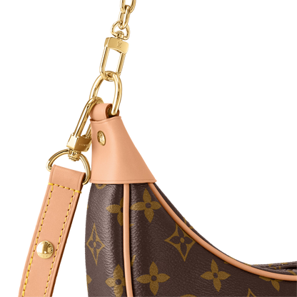 Close-up of a brown leather handbag with gold chain and strap on a transparent background
