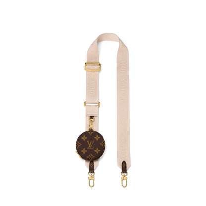 Beige strap with gold hardware and a Louis Vuitton monogrammed patch on a white background